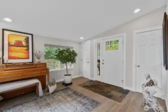 Large Entry with coat and shoe closets.