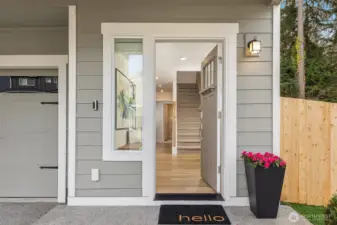Covered porch welcomes guests.