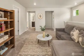 Seating area on top floor with access to laundry and full bathroom.