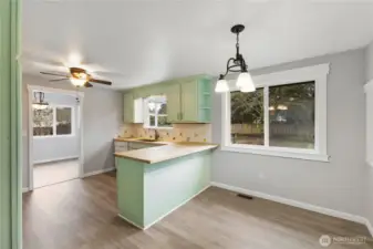 Additional eating space off kitchen.