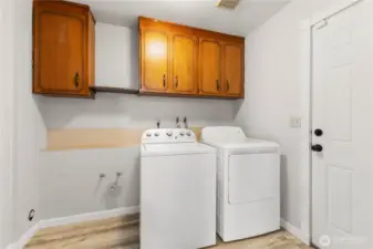 Utility room on lower level, just inside the attached 2-car garage.