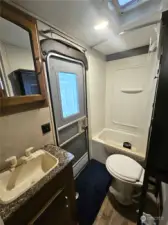 Bathroom with tub and shower