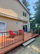 Private back deck with motorized awning for shade in the summer and heaters for the winter.