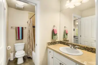 A nice upstairs Jack and Jill Bathroom with shower over the tub. Both the 3rd and 4th bedrooms have there  own separate sink area and cabinet space.