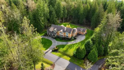 This lovely 3 acre lot is surrounded by natural forest and the beauty of the Northwest. The back lot line is well back into the trees creating a nice buffer zone between the neighbors.