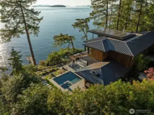 The primary home has significant patio space and beautiful pool for entertaining and enjoyment.