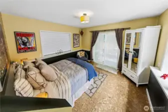 Lower suite Bedroom with slider to back patio