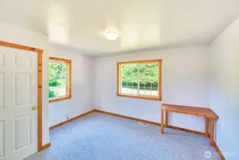 Bedroom #2 with large closet and faces east.