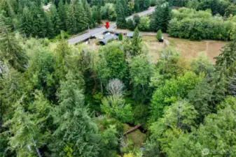 Drone view of corner to entire property