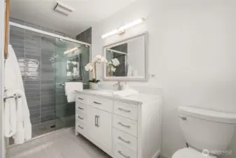 Primary 3/4 bath en suite with heated floors.