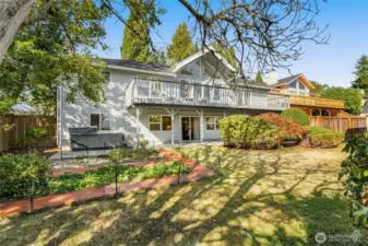Backyard elevation. Room with work, garden, and play!