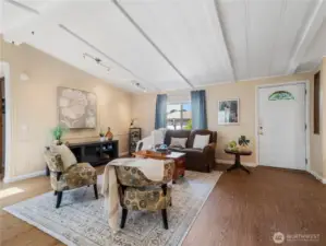 The front door welcomes you into the warm living space.