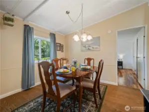 There is room for a large dining room table. Many of the furniture can be purchased as the owner no longer are in need of them.