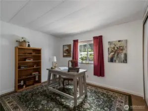 The third bedroom, here staged as an office is also located at the front of the home.