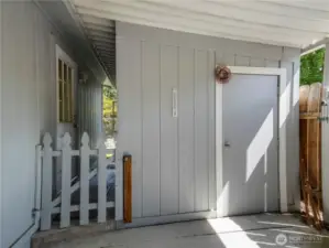 The storage shed holds all your tools and more. It has electricity. Maybe you will use it as a little workshop?