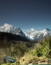 Mount Index (at left) and Mount Persis rise above Heybrook Ridge and the forested valley in this photo taken from above the cantina. A moderate hike begins on the outskirts of Index and climbs to the top of Heybrook Ridge for spacious mountain views. Less than a mile from town is the trailhead for Lake Serene, an alpine beauty backed by the 3,000-foot eastern cliffs of Mount Index.