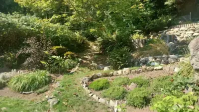 The Sky Rock Garden has pathways that run through the garden, with its alpine phlox, spirea, ninebark, Siberian iris, coral bells, candytuft, Oregon grape and other plantings. Landowner is a mountain hiker and climber who recently added gardening to his hobbies and built the garden. A shady sitting area at the top of the garden offers glorious views of Mount Index and the river.