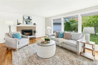 Living room with gas fireplace and hearth
