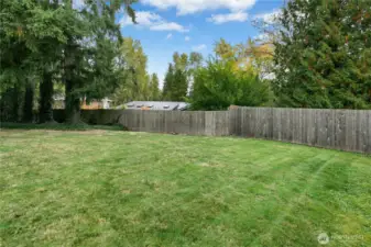 The private yard is fenced and fully usable