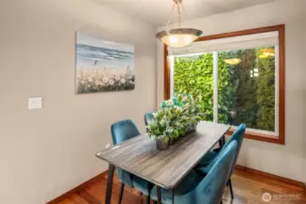 Breakfast nook filled with light from south facing window.