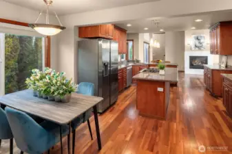 Gourmet Kitchen, breakfast nook, center island, eating counter, granite countertops, corner-set sink, stainless appliances, Butler's pantry, and walk-in pantry.
