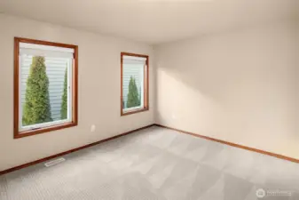 3rd Bedroom offers Milgard casement window, large closet and lush carpet.