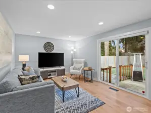 Family room is set up nicely with direct access to park like back yard.