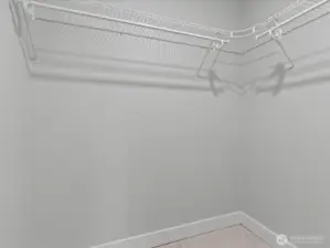 Spacious walk in closet in Primary suite.