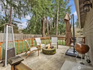 Back patio with fire pit will create some fun memories this Summer!