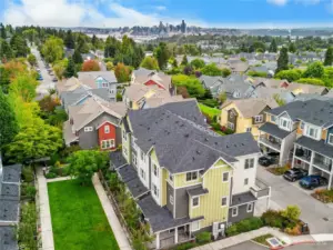 Enjoy a view of the Seattle and Bellevue skyline from the primary bedroom.