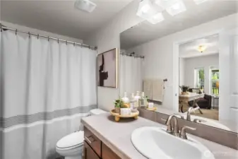 Full, private bathroom off the downstairs bedroom.