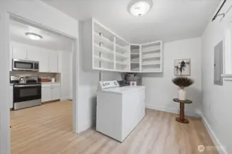 Large laundry area & mudroom off the kitchen and the backdoor.