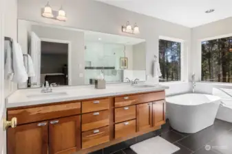 Oversized vanity with double sinks provides plenty of storage.