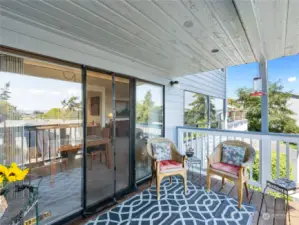 One end of deck, the deck is large and has gorgeous views of the bay.