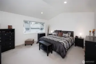 Upstairs primary suite has 5 pc bath and walk in closet.