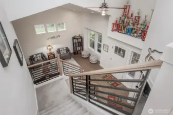Open entry plan with high ceilings and skylights.