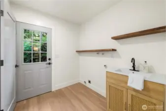 LAUNDRY WITH SINK OFF KITCHEN! MORE STORAGE AND HALF BATH