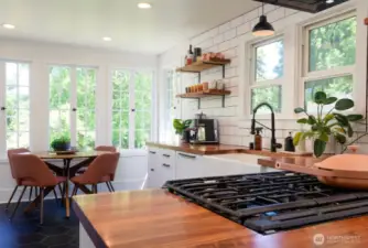 Sleek finishes, smart storage, and stainless appliances make this kitchen both beautiful and functional.