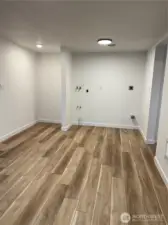 Dining room with laundry area