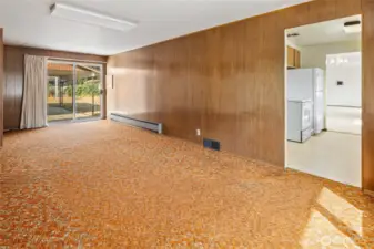 A bonus room is located off the kitchen.