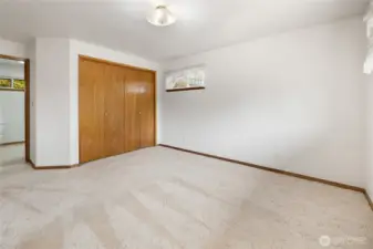 Large double closet in primary bedroom.