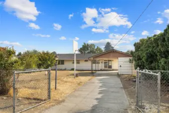 There is alley access to the backyard with extra parking space.