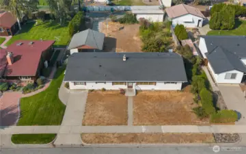 Oversized lot offers lots of potential here.