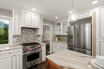 There is an abundance of prep and storage space in this kitchen. And enjoy the filtered water and ice in the brand new Fridgidaire refrigerator.