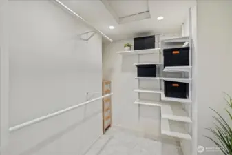 The walk-in closet maximizes storage space and has room for a dresser and a lot of hanging space.