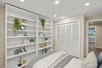 Bedroom #4 has beautiful built-in shelving that stays with the home.