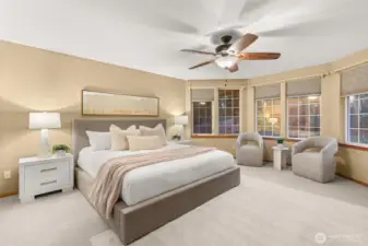 The primary suite offers comfort, space, and privacy.