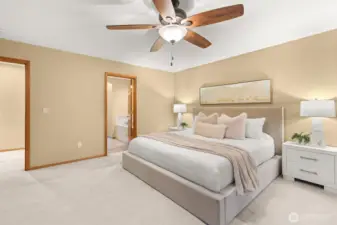 Elegant primary suite with tranquil views and easy access to the luxury bath.