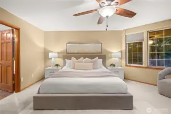 Large windows and soft natural light create a relaxing atmosphere.