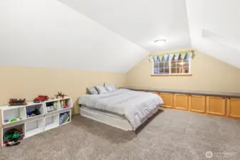 Upstairs bonus room/flex space perfect for media, play, or hobbies.